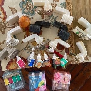Bath and body works plug ins.  11 new unopened refills and 11 plugs